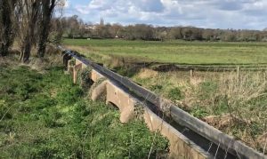 An aqueduct in the Devon landscape. How the Romans Moved Water Uphill.